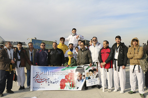 گزارش تصویری / حضور خانواده تکواندو پایتخت در مراسم راهپیمایی ۲۲ بهمن ماه